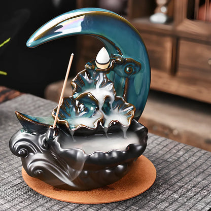 Monochrome glazed porcelain backflow incense burner with smoke waterfall effect and abstract Chinese design