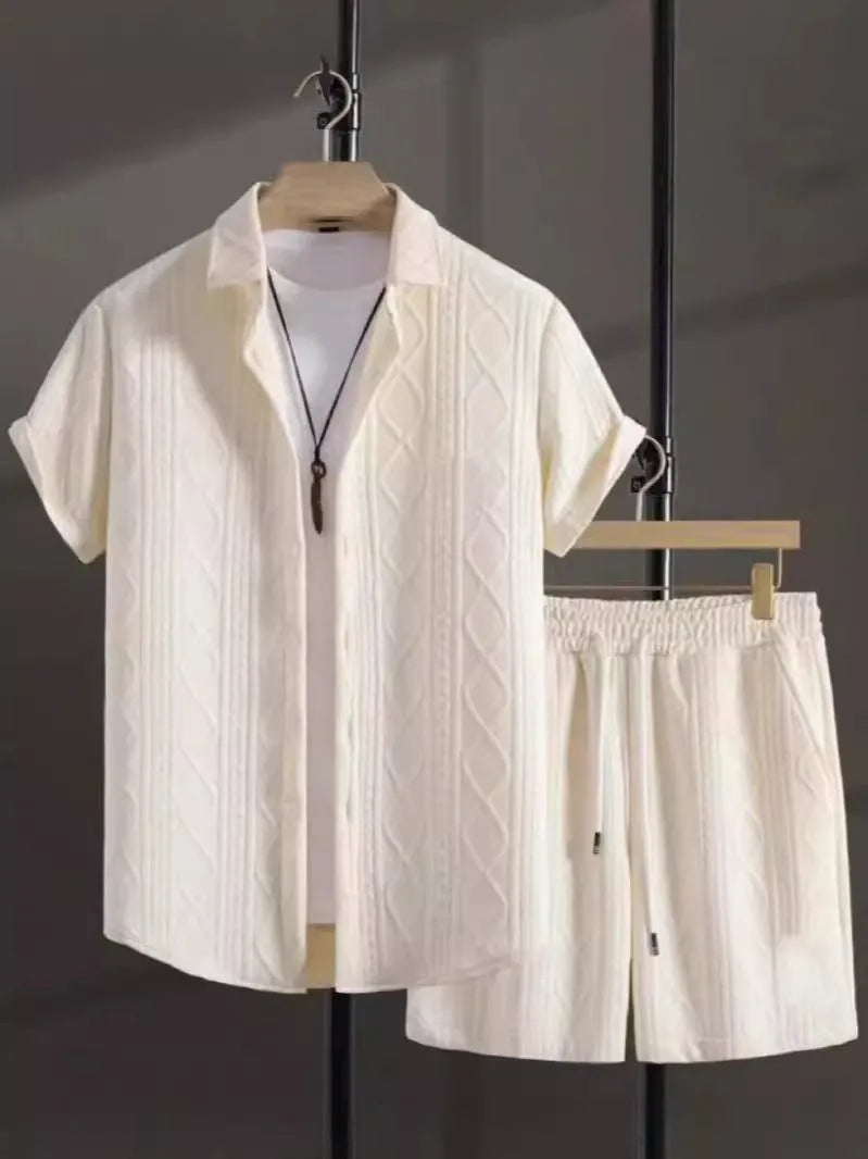 Jacquard short sleeve suit separates in chemical fibre blend polyester with shirt-style jacket and matching shorts