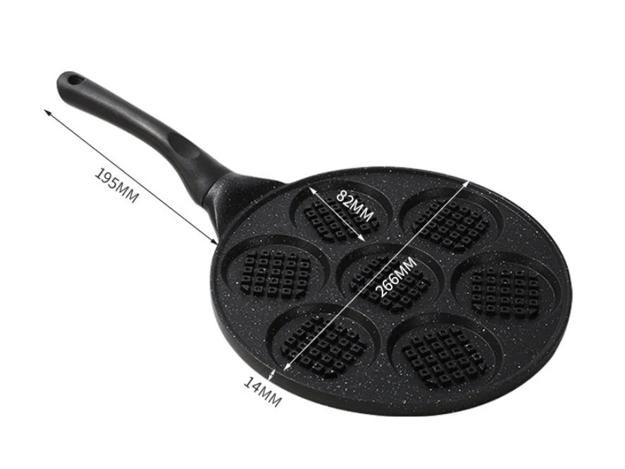 Seven-hole aluminium barbecue plate with non-stick surface on gas hob
