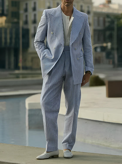Blue and white striped polyester suit set with blazer and pants on mannequin