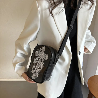 Halloween graffiti print crossbody bag in black with pumpkin, ghost, and bat designs, measuring 14x23x9.5cm