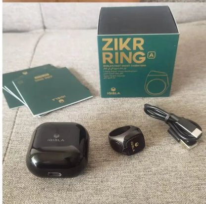 Zikr1 smart ring in metal with OLED display showing time and Tasbih count, sizes 18mm-22mm