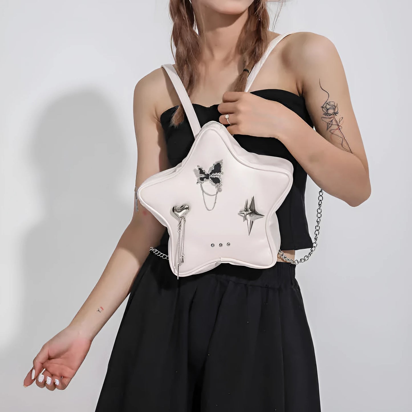 Soft PU women's messenger mini backpack in black, white or silver with dual shoulder carrying options