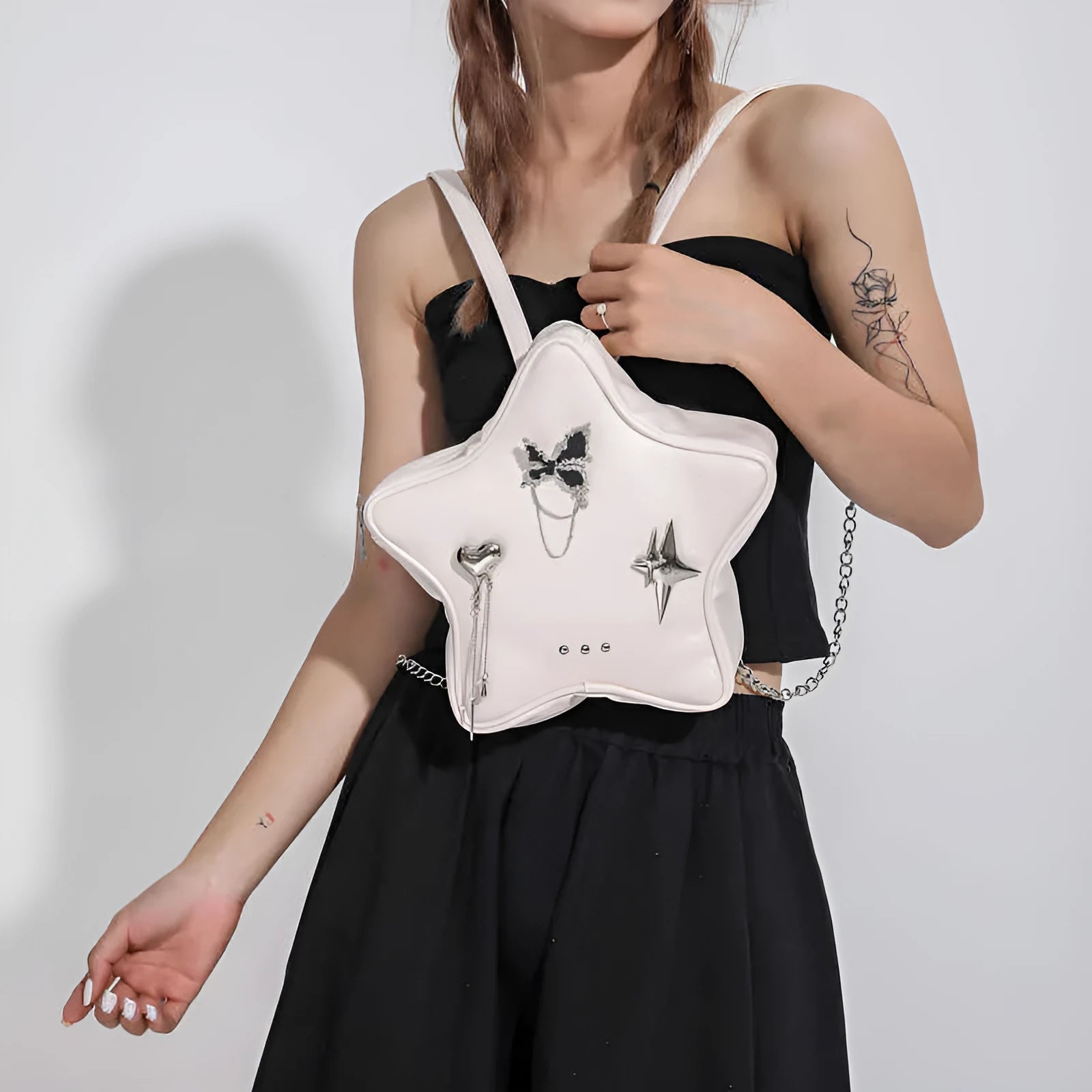 Soft PU women's messenger mini backpack in black, white or silver with dual shoulder carrying options