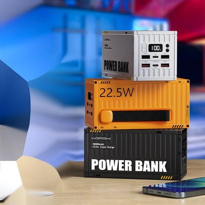 Yellow 50000mAh portable power bank with digital display showing battery percentage and multiple USB ports.