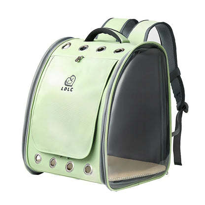 Blue pet backpack with transparent PVC windows showing interior, adjustable shoulder straps, and ventilation holes