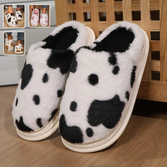 Cozy plush cow-print slippers with non-slip soles for comfortable indoor wear