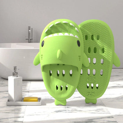 Colorful shark-themed shower slides with drainage holes, designed for comfortable and practical use in the pool or shower.