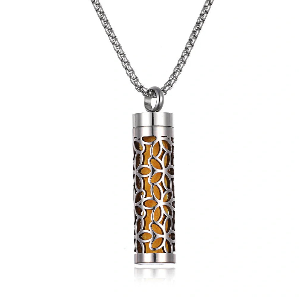 Titanium steel aromatherapy pendant with essential oil diffuser in various color options