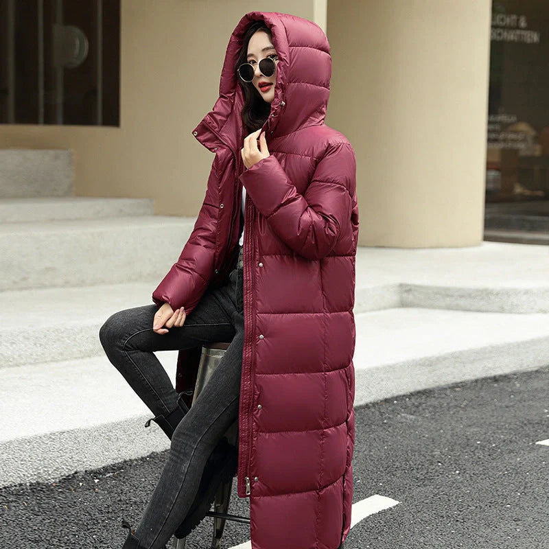 Women's long winter down puffer coat in black, dark red, white, and khaki colors