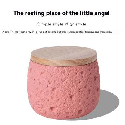 Handmade cement pet cinerary casket in rectangular shape with handcrafted texture, shown in one of six available colours