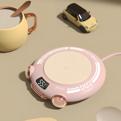 Green portable coffee mug warmer with touch controls and 100mm heating surface for office desks