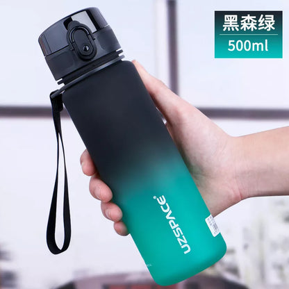 Large capacity Tritan sports water bottle in vibrant colors, perfect for hydration on the go