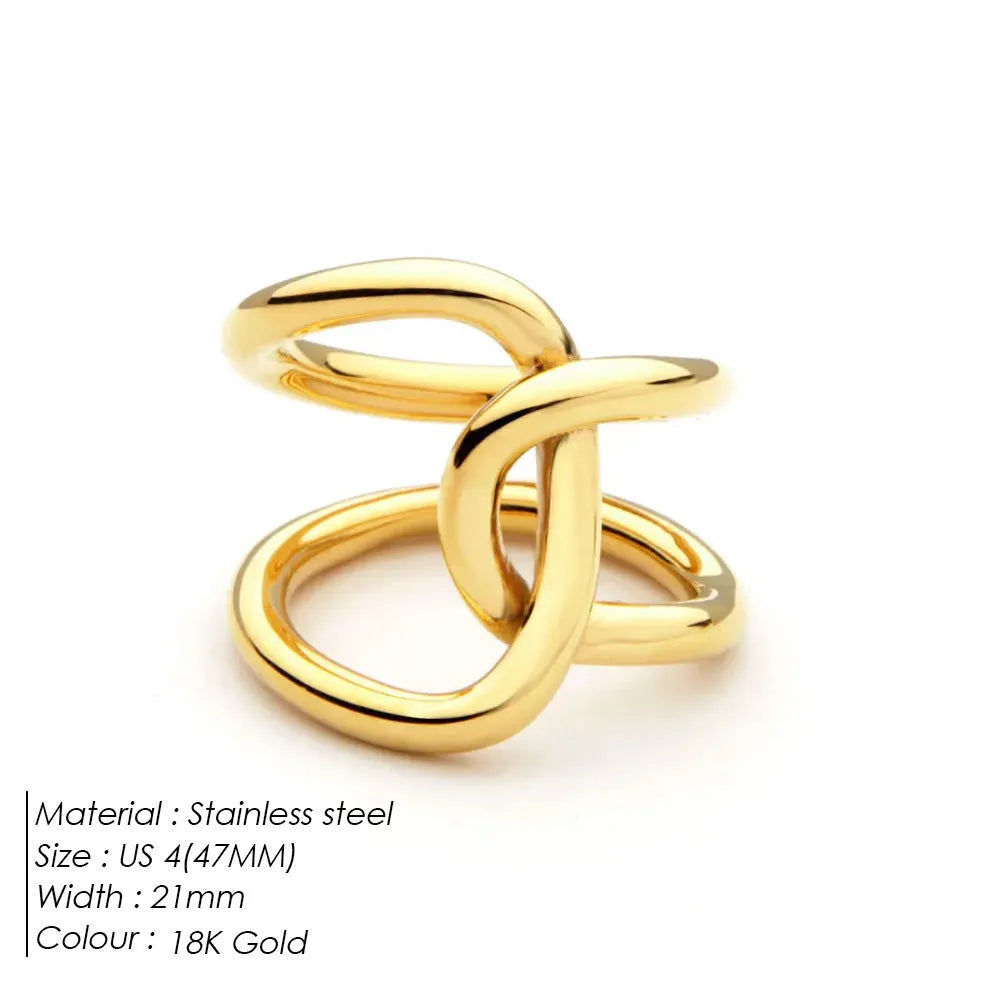Knotted adjustable stainless steel ring for women in gold or steel colour on a grey background.