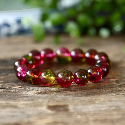 Women's personalised bracelet with hand-threaded watermelon crystal beads.