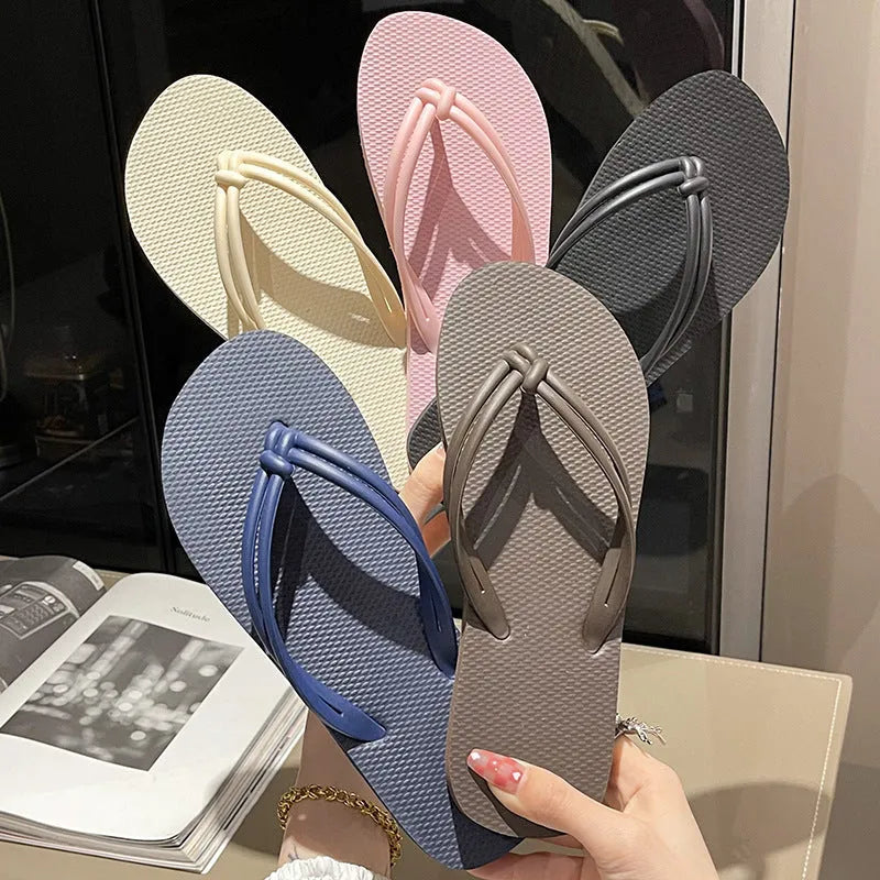 PVC injection moulded flip flops in toe-covering casual style with non-slip sole