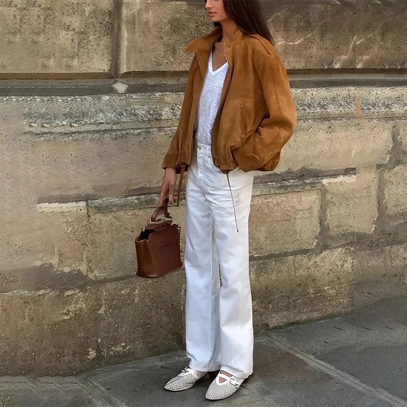 European and American retro solid colour jacket in loose fit with long sleeves, made from 100% polyester fabric.