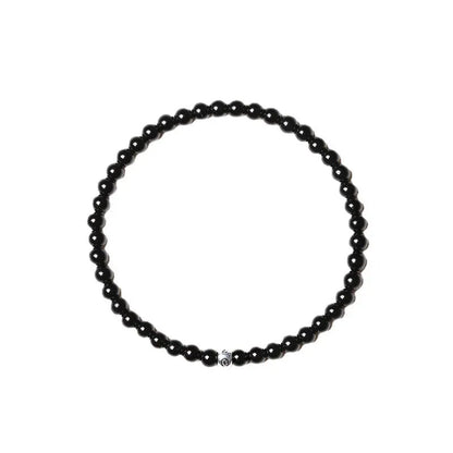 Geometric unisex bracelet with small Obsidian, blue San, and textured black agate beads.