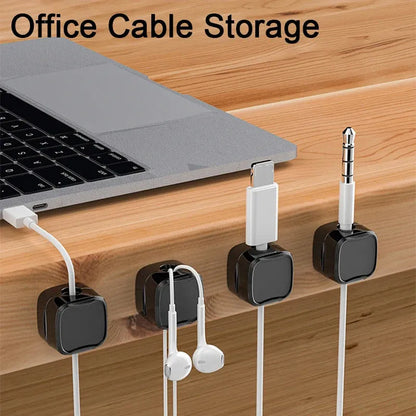 Black and white magnetic cable clips for under desk cable management with adhesive backing