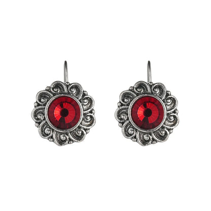 Pair of retro Bohemian carved drop earrings in red alloy for women, shown as a single pair
