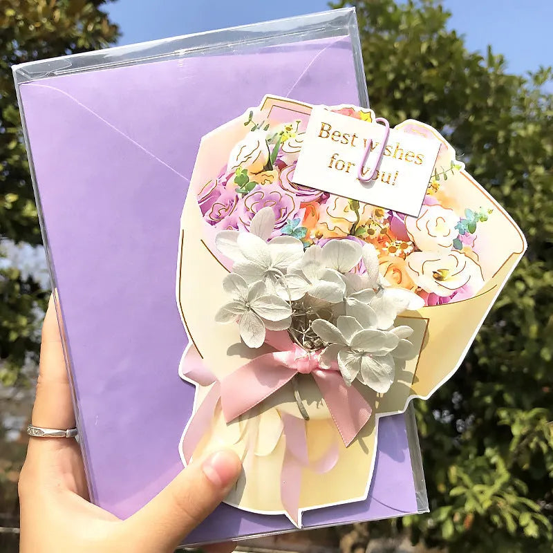 Handmade 3D pop-up greeting card with butterfly shape showing artificial flowers and hot stamping details