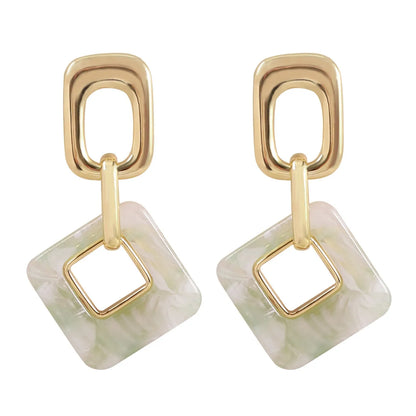 Hollow geometric square earrings with chamfered corners and electroplated copper finish