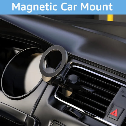 Black magnetic car phone holder clipped onto a car air vent, showing O-ring magnet and silicone grips.