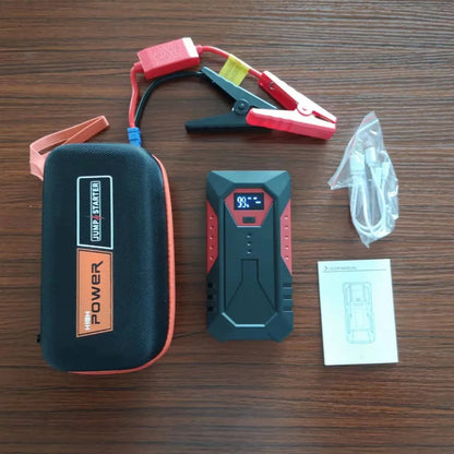 Red 12V emergency start power source with 18800 capacity, battery clamp, and data cable for car jump starting