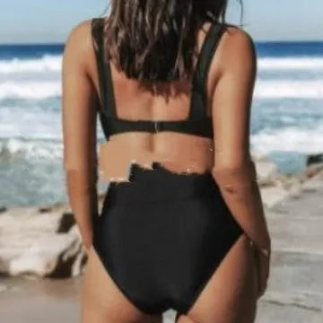 A woman's solid colour bikini set in a slim fit, shown in one of the available colours.