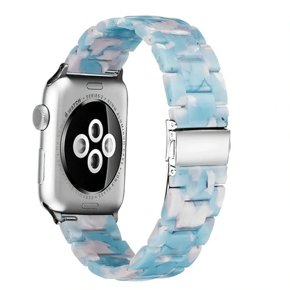 Slim resin Apple Watch strap showing attachment mechanism and colour options
