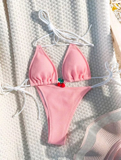 Solid colour briefs-style bikini swimsuit on a hanger, showing the top and pants.
