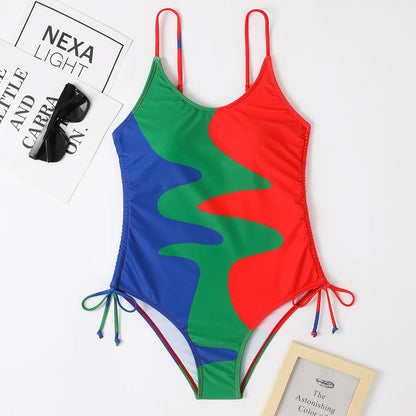 A blue one-piece swimsuit for women, showing sleeveless and backless design on a mannequin.