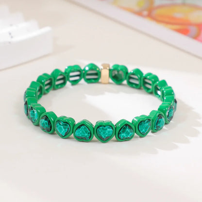 Rainbow enamel heart-shaped stretch bracelet in alloy with diamond process surface