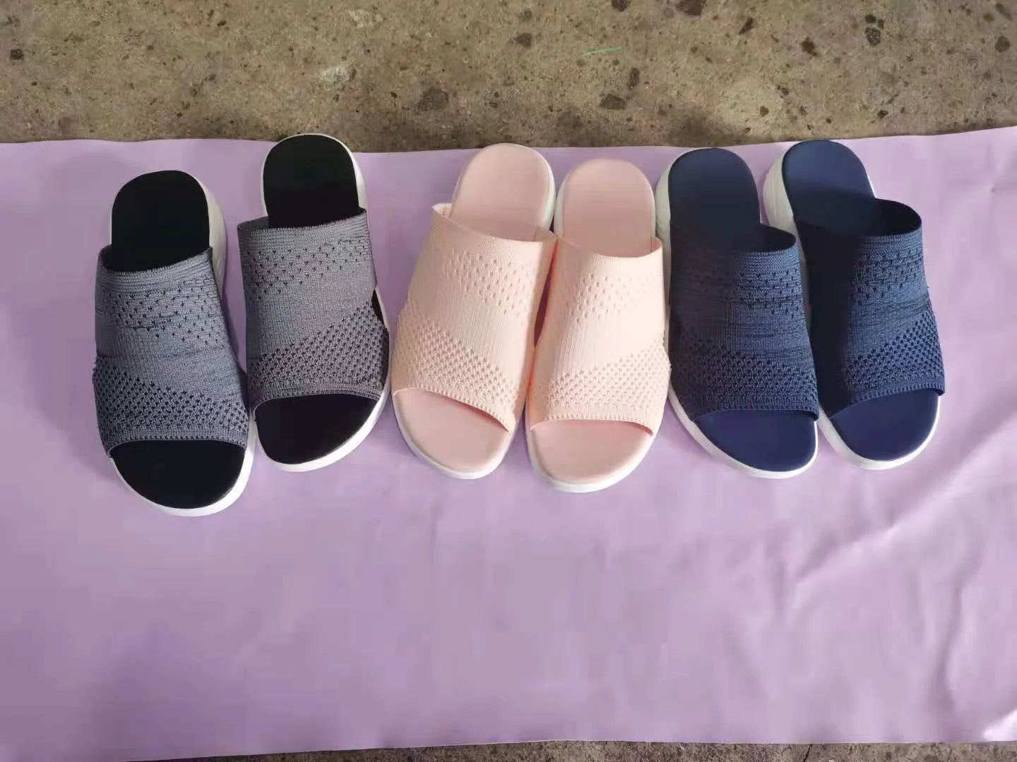 Women's lightweight mesh beach sandals with woven design in blue, grey, and pink