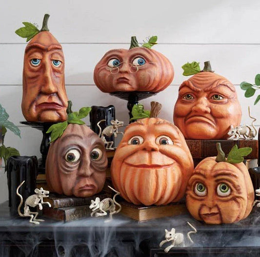 A collection of resin-crafted pumpkins in various sizes and shapes, perfect for Halloween decorations and displays.