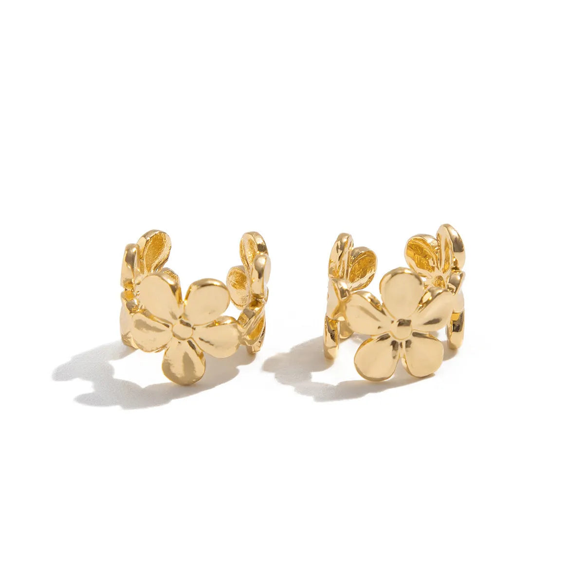 Gold electroplated alloy earrings with starfish and conch design elements for women's beach fashion