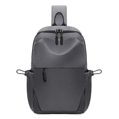 Grey waterproof polyester chest bag with shoulder strap showing 33cm height and 20cm width dimensions