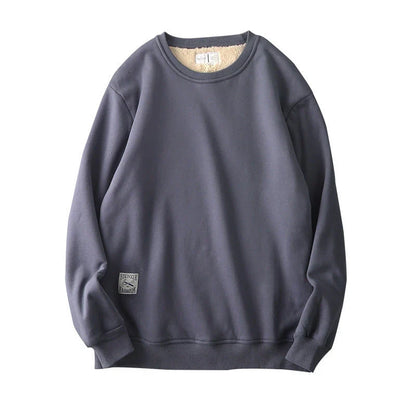Cozy fleece pullover in a variety of classic colors, featuring a warm and soft fabric blend, stylish round neck design, and comfortable long sleeves.