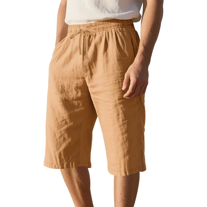 Men's linen shorts in light blue with drawstring waist and cropped straight-leg design