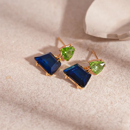 Geometric stud earrings for women in alloy with electroplated gold tone and steel needle, shown in four colour options.