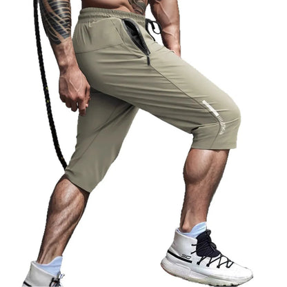 Men's cropped sports pants in quick-drying nylon with straight fit and elastic waistband