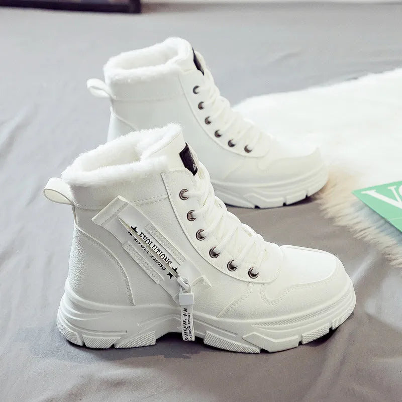 Plus size women's fleece-lined snow boot with tall crown, mid-heel, and front lace-up fastening.