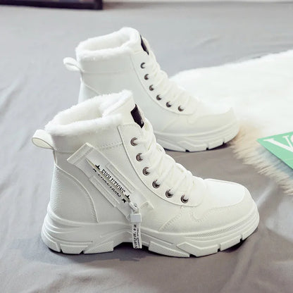 Plus size women's fleece-lined snow boot with tall crown, mid-heel, and front lace-up fastening.