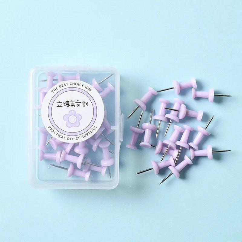 Macaron colour plastic push pins in cherry blossom pink, mint green and lavender, available in large and small sizes