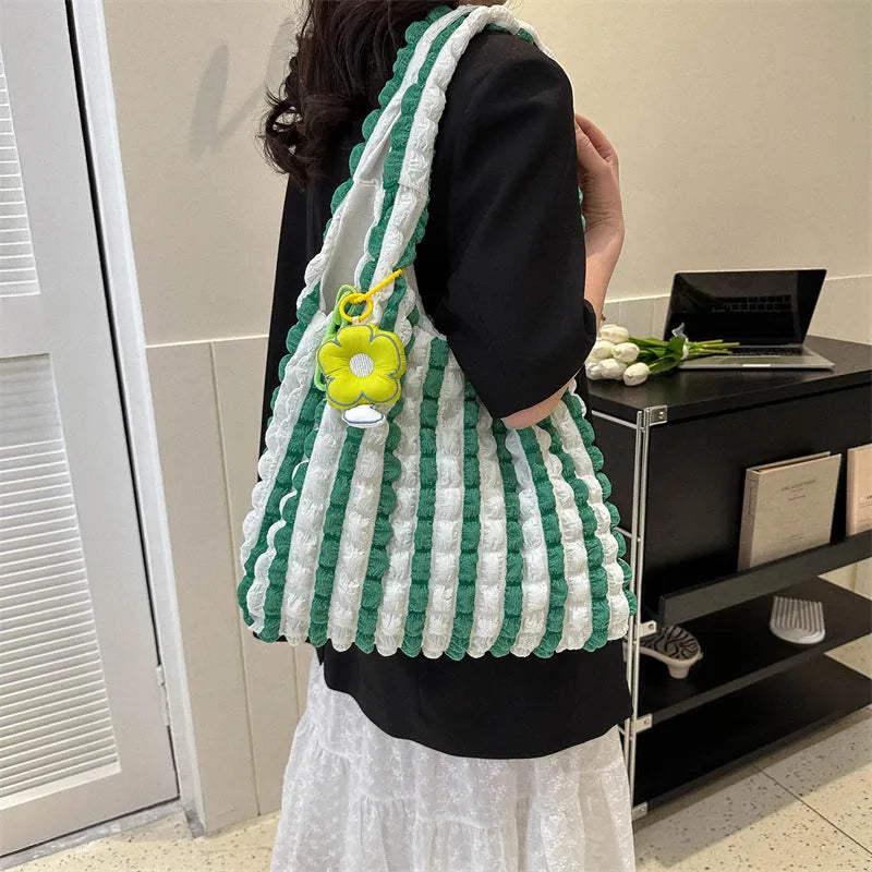 Women's pleated bubble crossbody bag in vertical square shape with pendant accessory