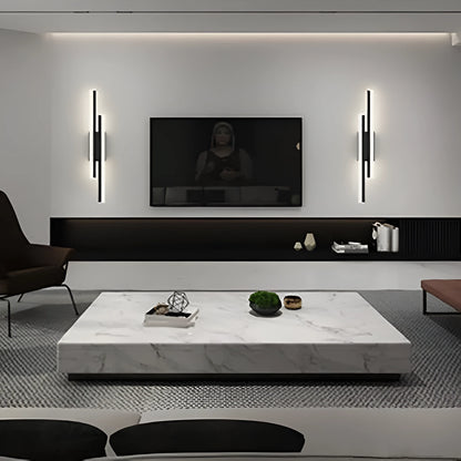 Scandinavian minimalist LED wall light with acrylic shade and adjustable arm in black or gold finish.
