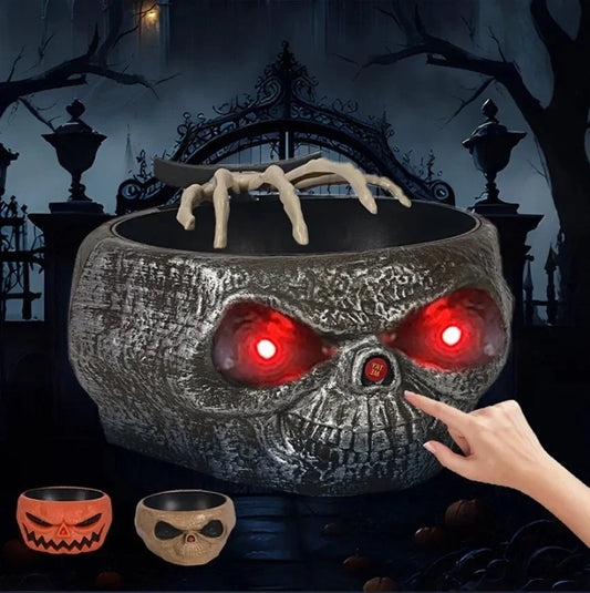 Motion-activated Halloween pumpkin candy bowl with lighted red eyes and skeleton hand