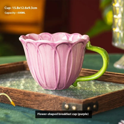 Ceramic breakfast cup with floral pastoral design holding 500ml capacity for tea or coffee