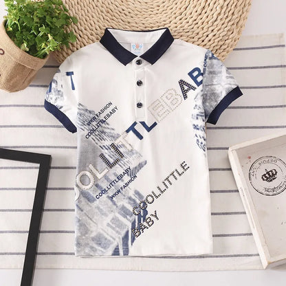 Boys short sleeve cotton lapel shirt in solid colour on a hanger.