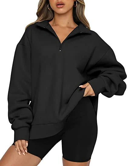 Women's zip turndown collar sweatshirt in various colors, showcasing loose fit and zipper detail.